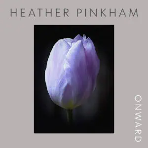 Cover of CD, with the name of the composer of the works, Heather Pinkham, and the title of the CD, Onward. Picture of a purple tulip